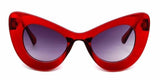 lunette oeil de chat rouge transparent années 50